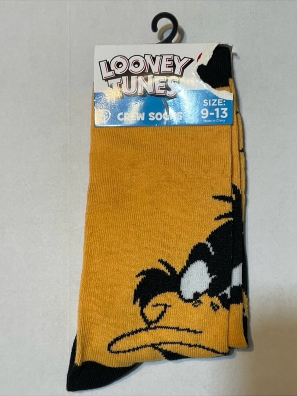 Warner Bros. Looney Tunes Crew Socks in Mustard Yellow with Daffy Duck